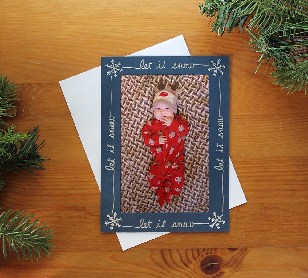 Navy blue Christmas photo insert card with a let it snow design