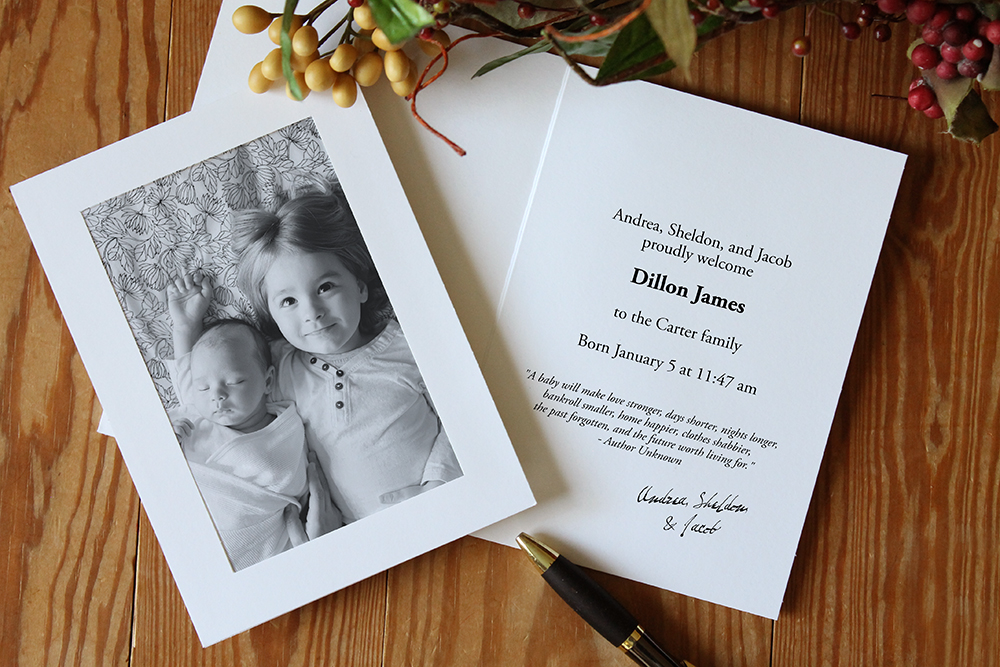White photo card with personalized birth announcement imprint