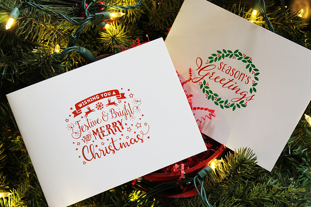 Christmas picture folders with red and green foil designs