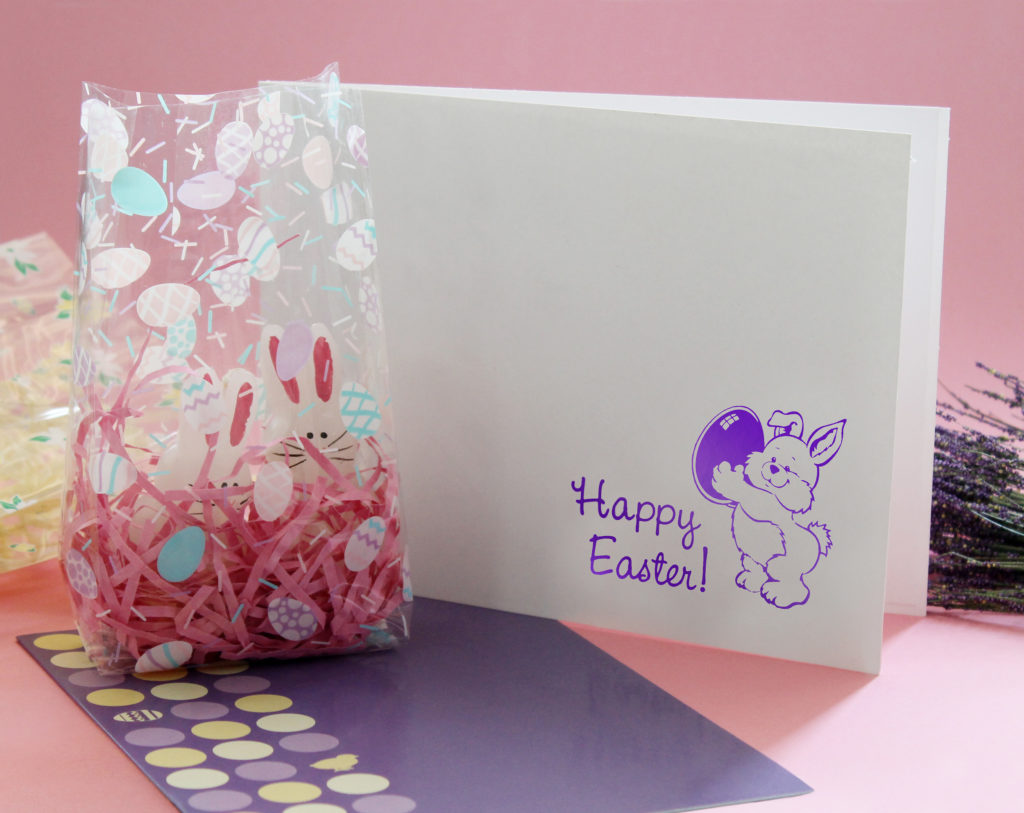 Easter egg design on a clear cello bag, with Easter bunny photo folders