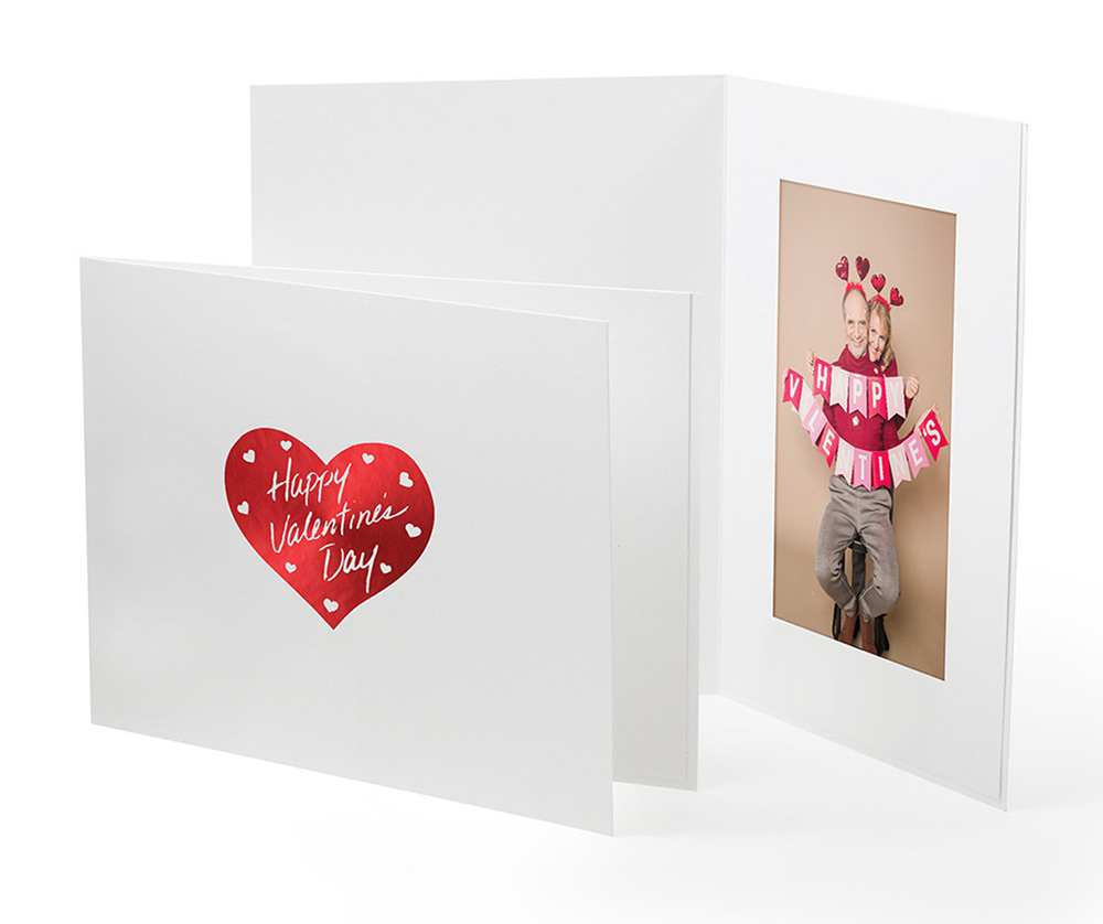 Horizontal and vertical white photo folders with red heart Valentine's Day design on the front cover