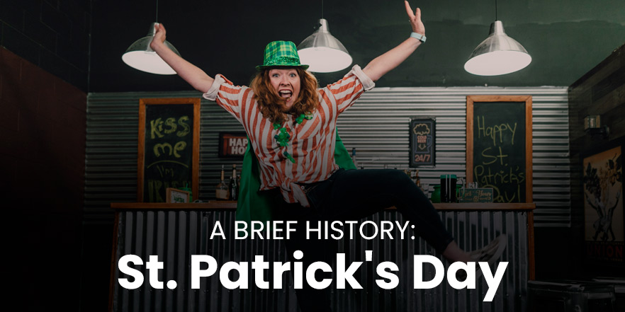 A woman in a green hat excitedly leaps in the air. Text on image reads, A brief history: St. Patrick's Day